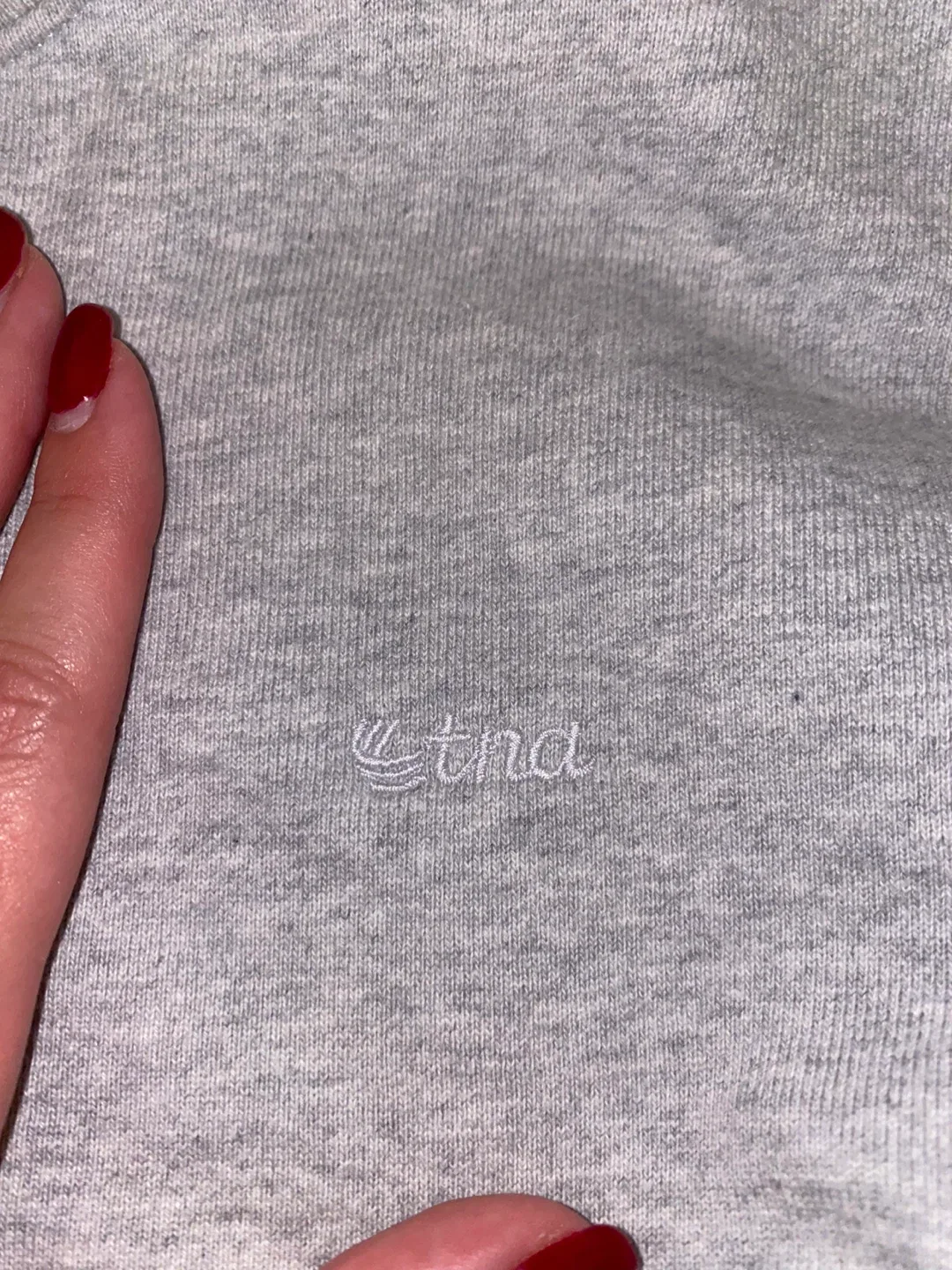 TNA heather grey crew neck image indicator(2)