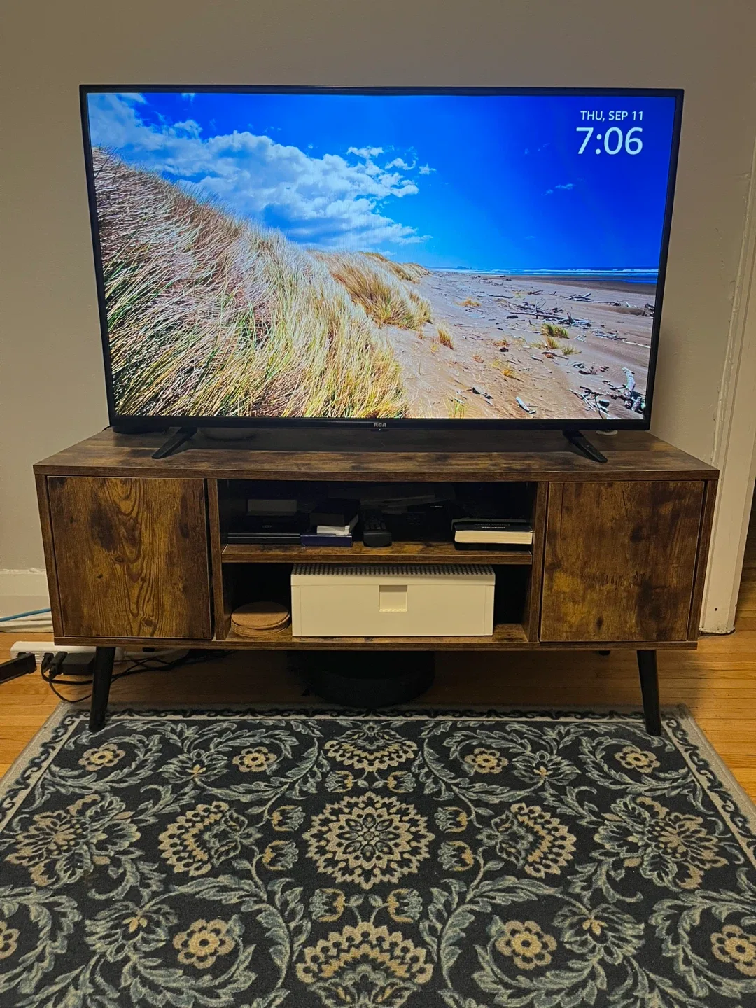 RCA TV on Rustic Brown TV Stand