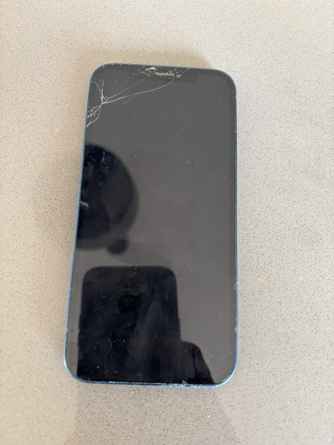 Blue iPhone 12 - Cracked Screen