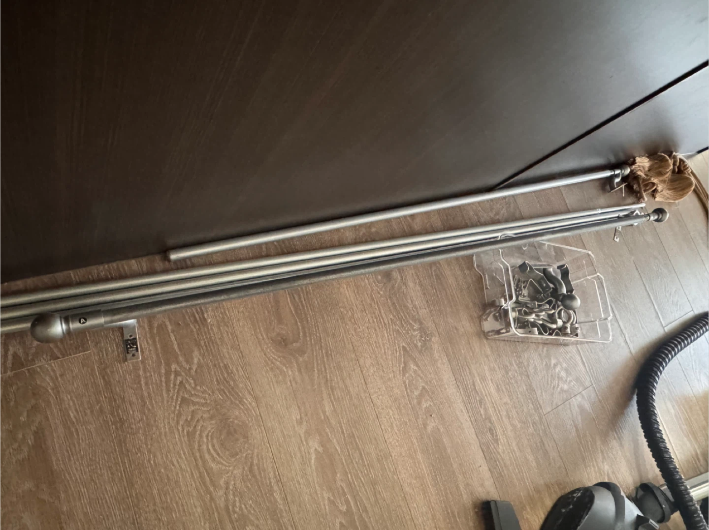 Selling 5 curtain rods in silver color, perfect for any room!