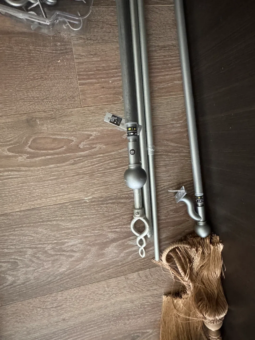 Selling 5 curtain rods in silver color, perfect for any room! image indicator(3)