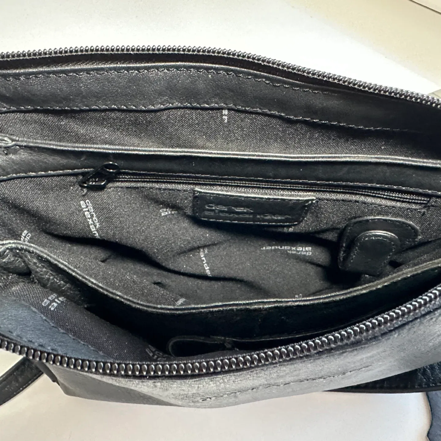 Derek Alexander Zip Top 3-Pocket Black Leather Crossbody Bag image indicator(9)