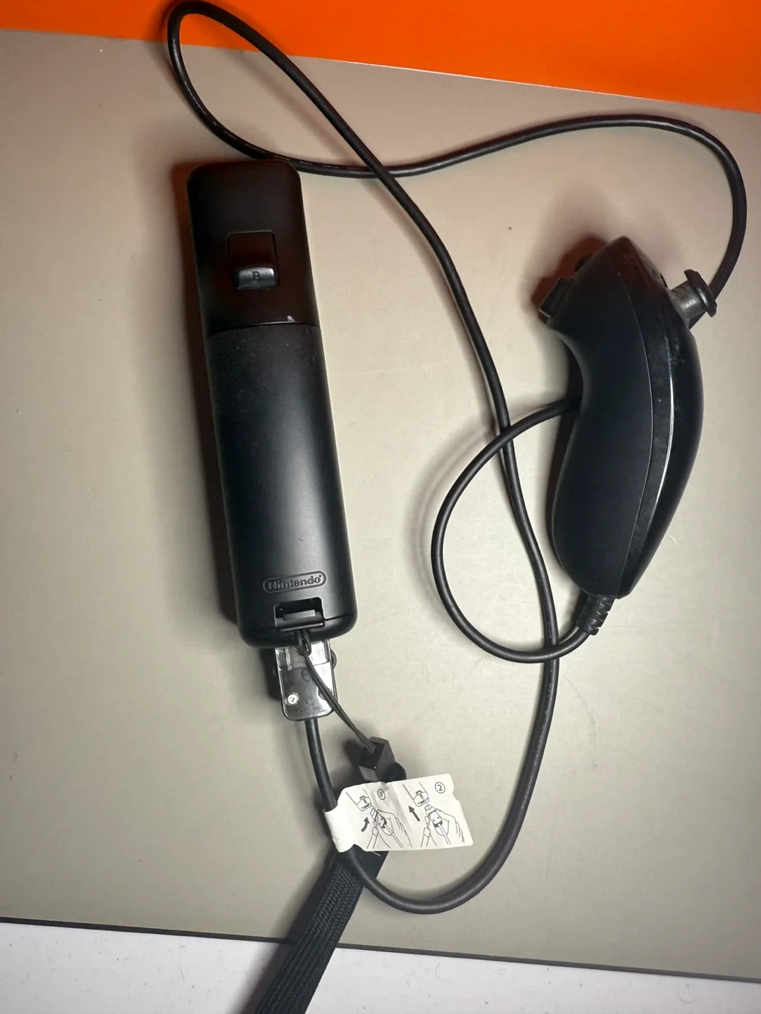 Official Black MotionPlus Nintendo Wiimote and Nunchuk For Sale! image indicator(2)