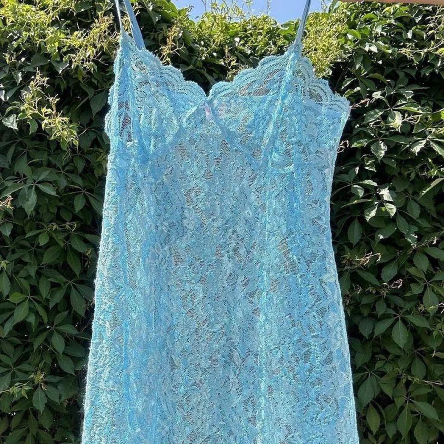 Baby blue lace sheer mini dress with ruffle hem image indicator(7)