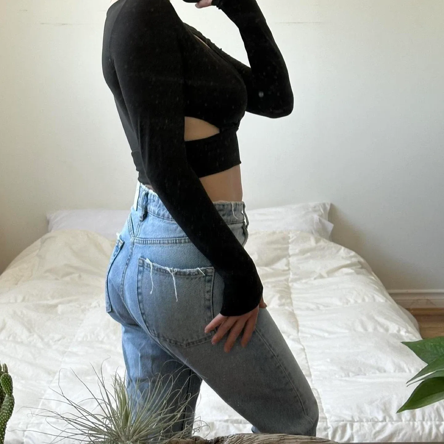 Black long sleeve crop top with cut out detail image indicator(4)