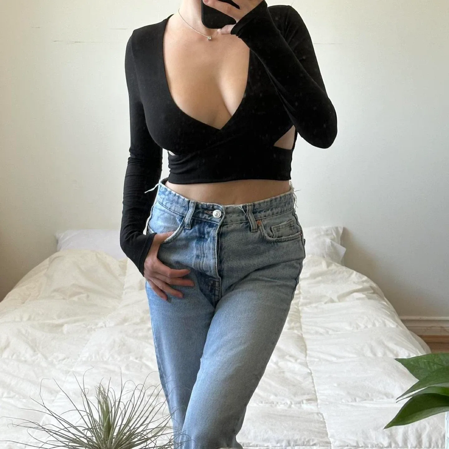 Black long sleeve crop top with cut out detail image indicator(6)