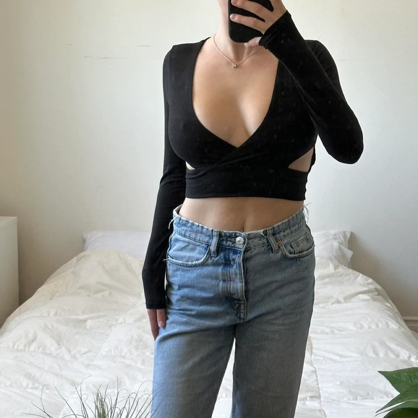 Black long sleeve crop top with cut out detail image indicator(7)