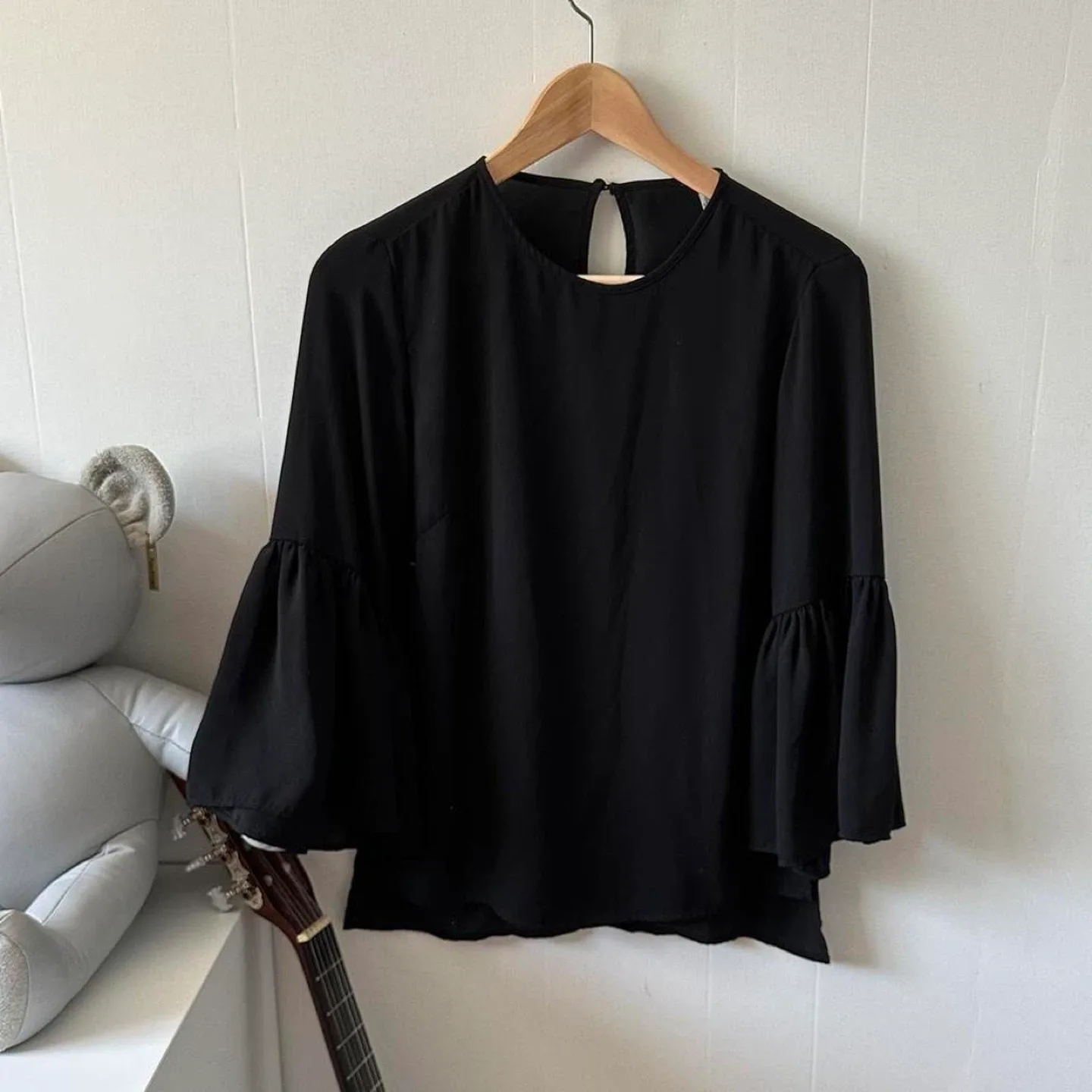 Black flowy bell sleeve blouse