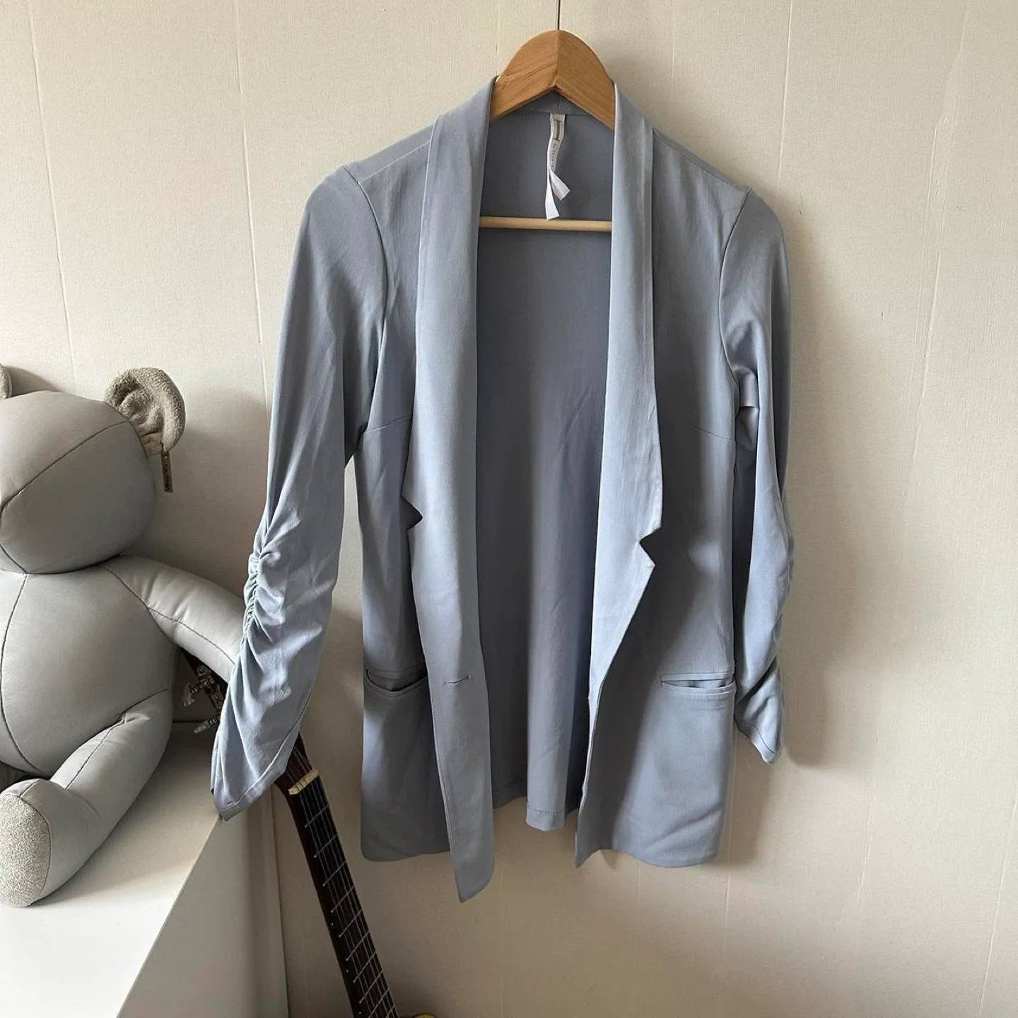 Light blue button up blazer with ruched sleeves image indicator(3)