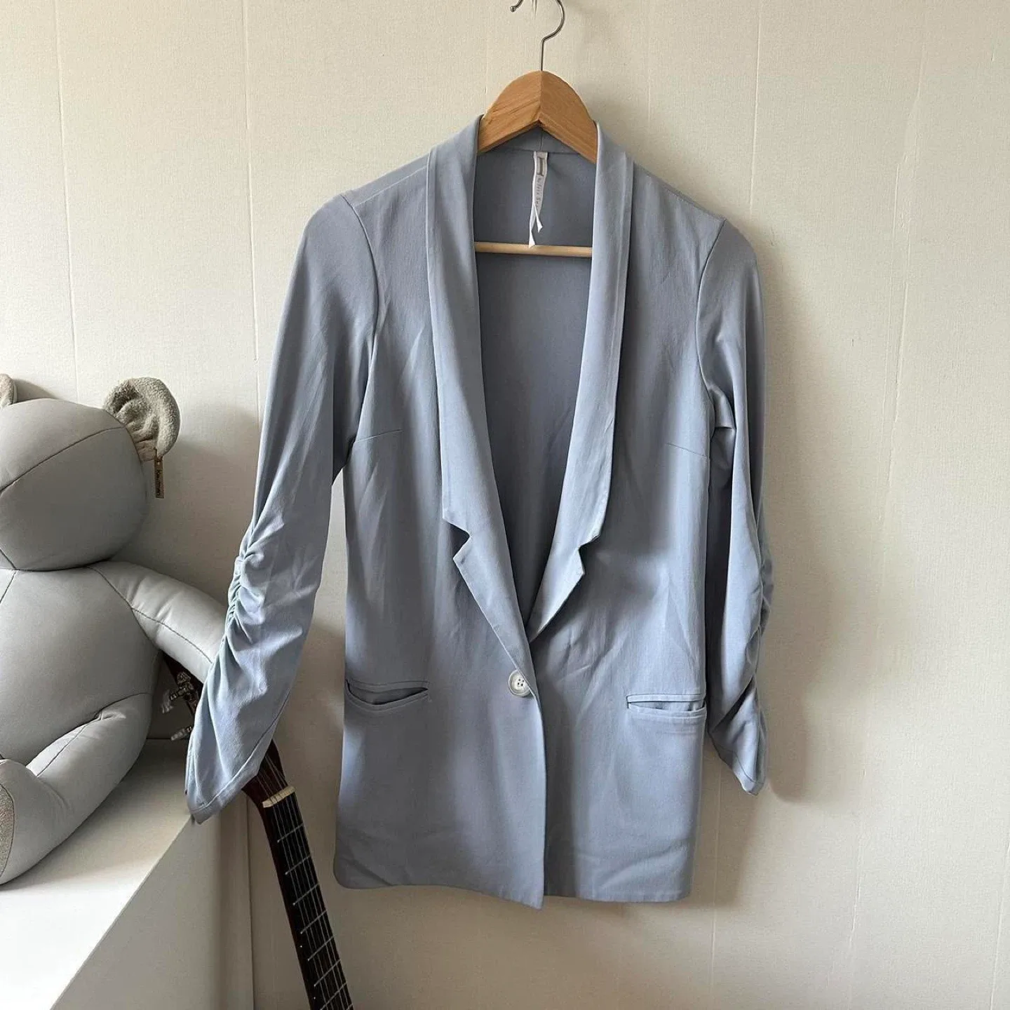 Light blue button up blazer with ruched sleeves image indicator(2)