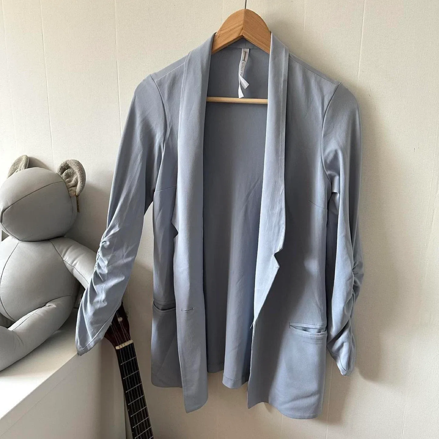 Light blue button up blazer with ruched sleeves image indicator(5)