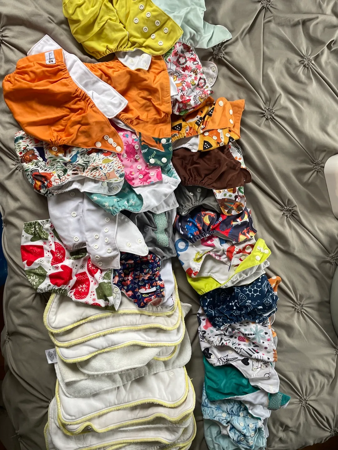 Lot of cloth diapers — over 25 diapers, plus many inserts. thumbnail