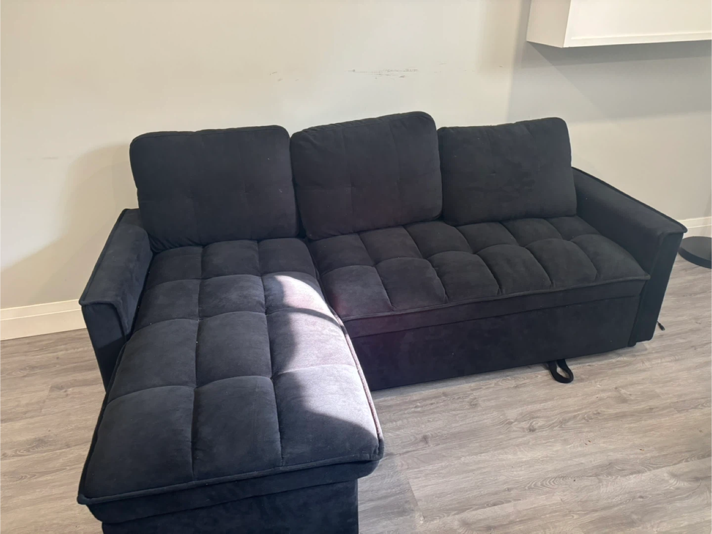 Black Sectional Sofa with Cushions