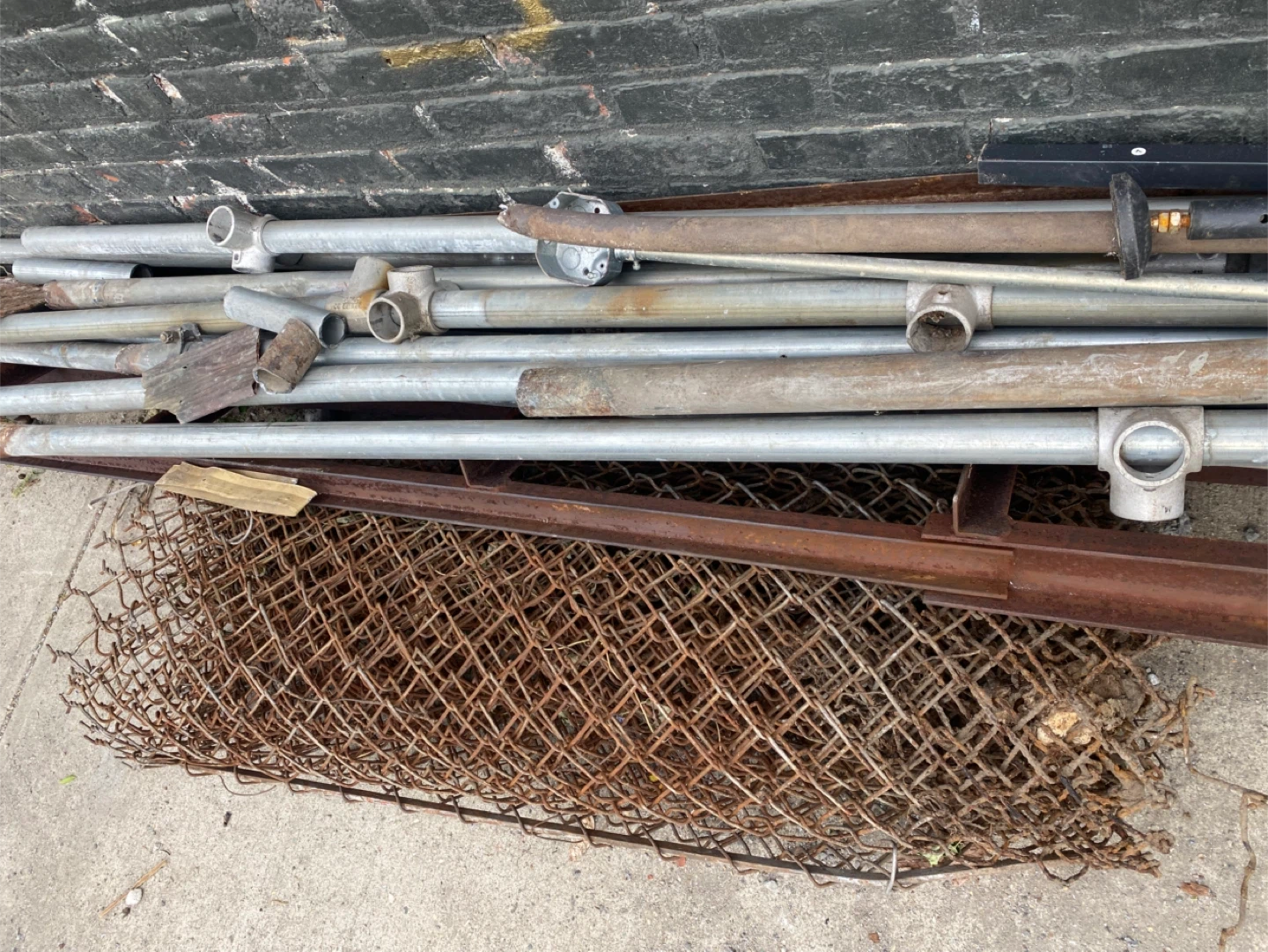 various metal pipes and fence - photo 2