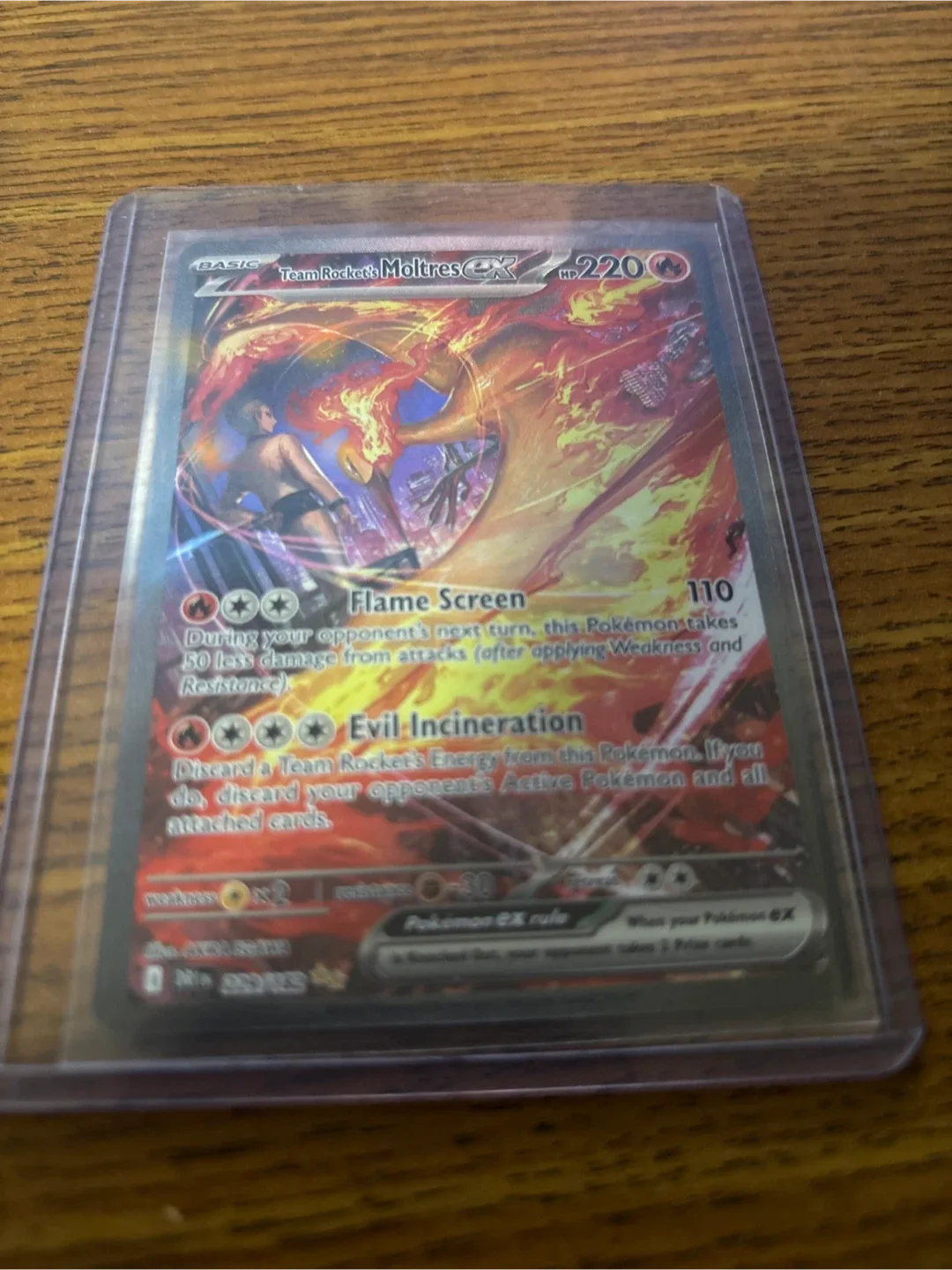 Team Rocket's Moltres EX Pokemon Card image indicator(3)