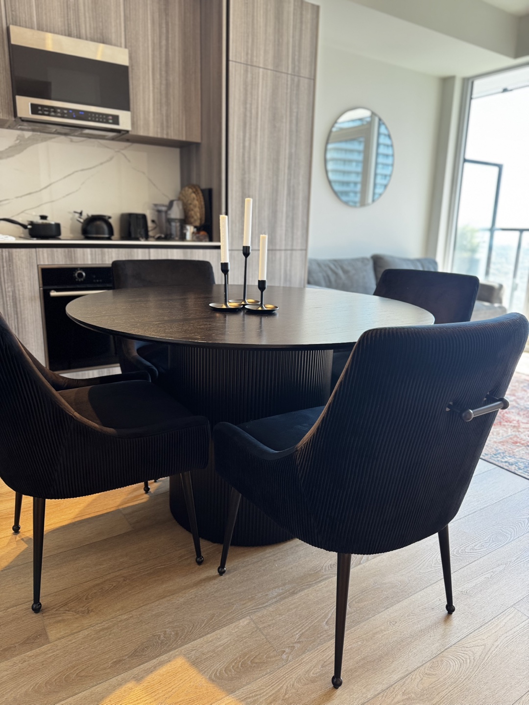 Round Dining Table with 4 Black Chairs