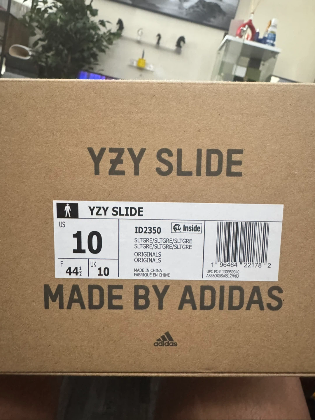 Yeezy Slides in Slate Grey, size 10.
