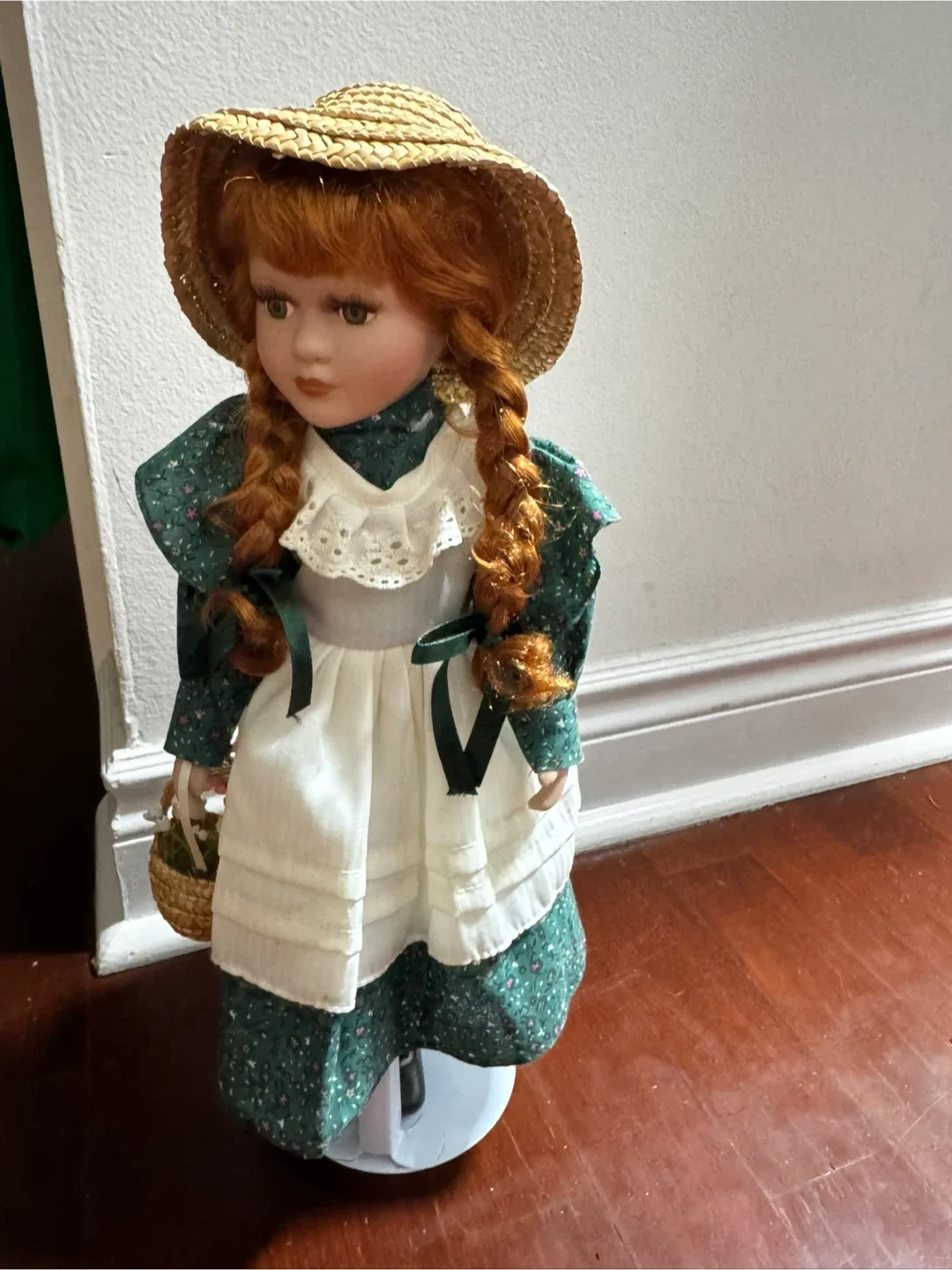 Collectible Porcelain Doll with Straw Hat thumbnail