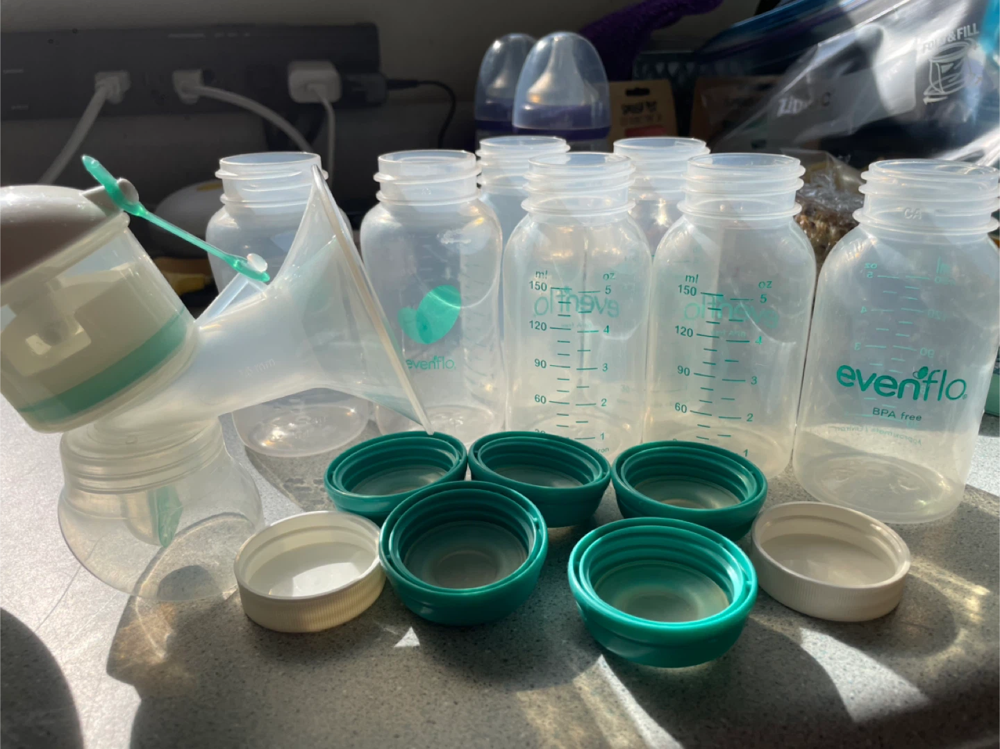 Evenflo Breast Pump and Bottles