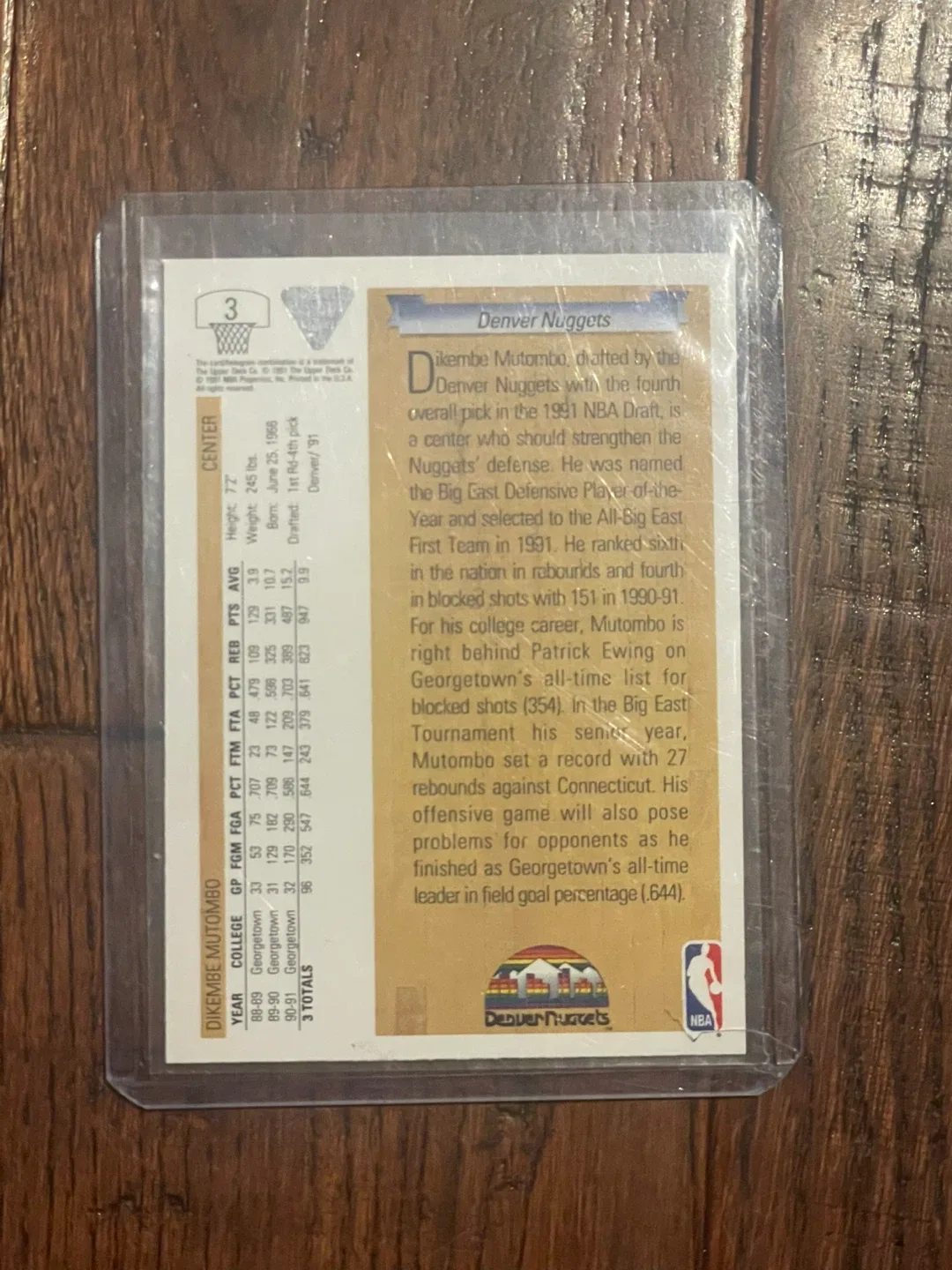 Dikembe Mutombo 1992 NBA Hoops Rookie Card in hard plastic case image indicator(2)