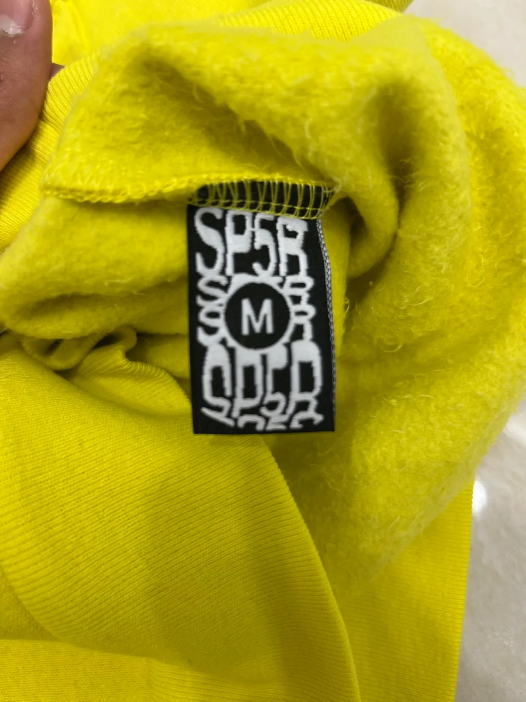 Yellow SP5DER Hoodie image indicator(2)
