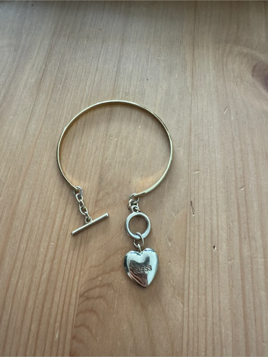 Guess Gold Tone Heart Bangle Bracelet image indicator(2)