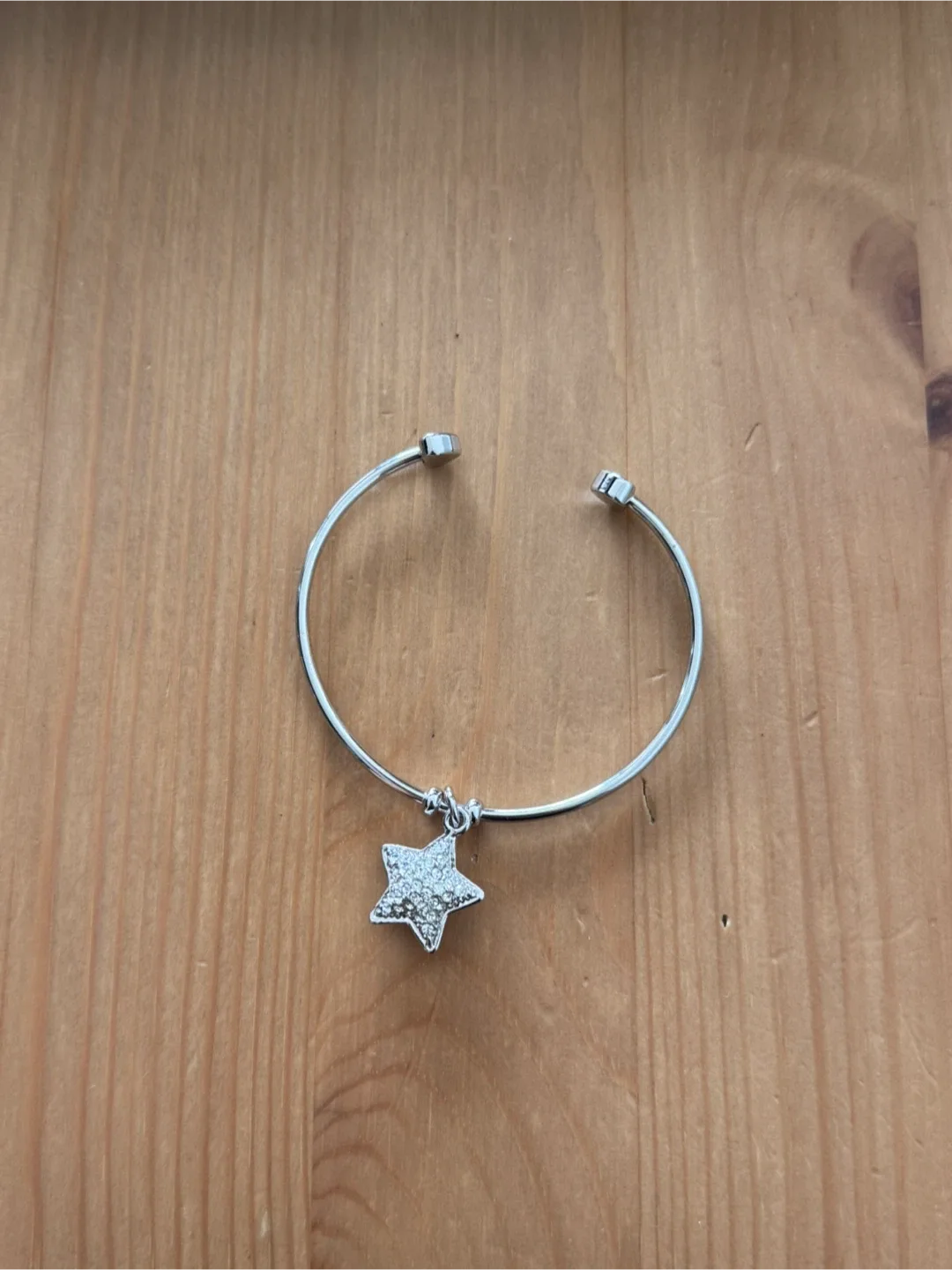 Silver Tone Bangle Bracelet with Star Charm thumbnail