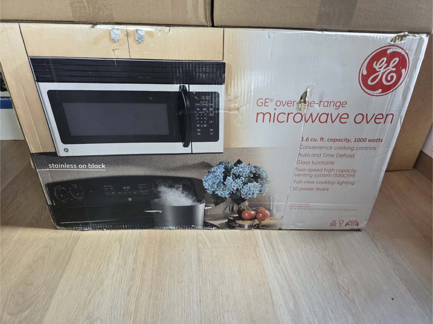 GE Over-the-Range Microwave Oven - Stainless on Black