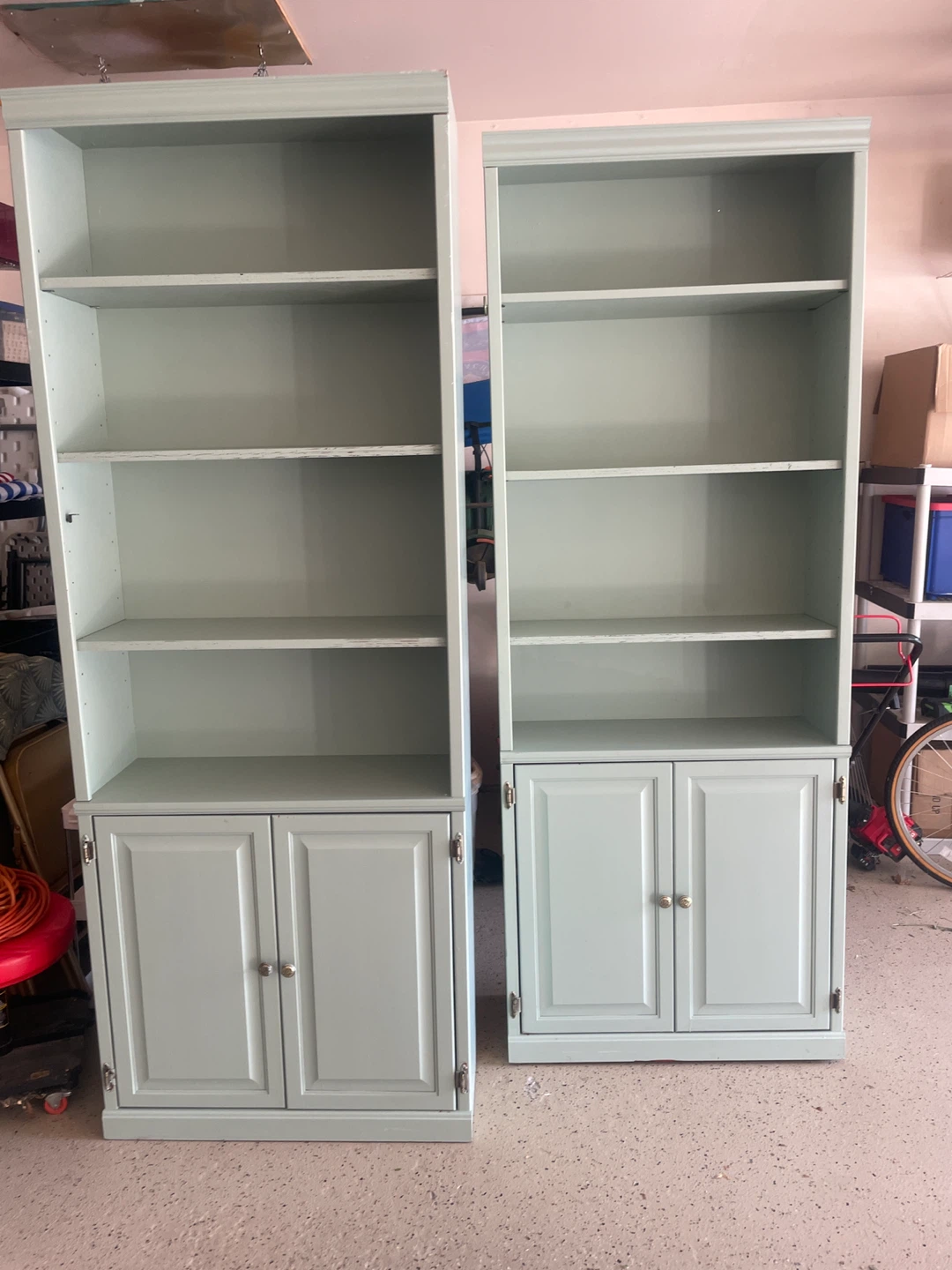 Two Light Sage Bookcases with Cabinets