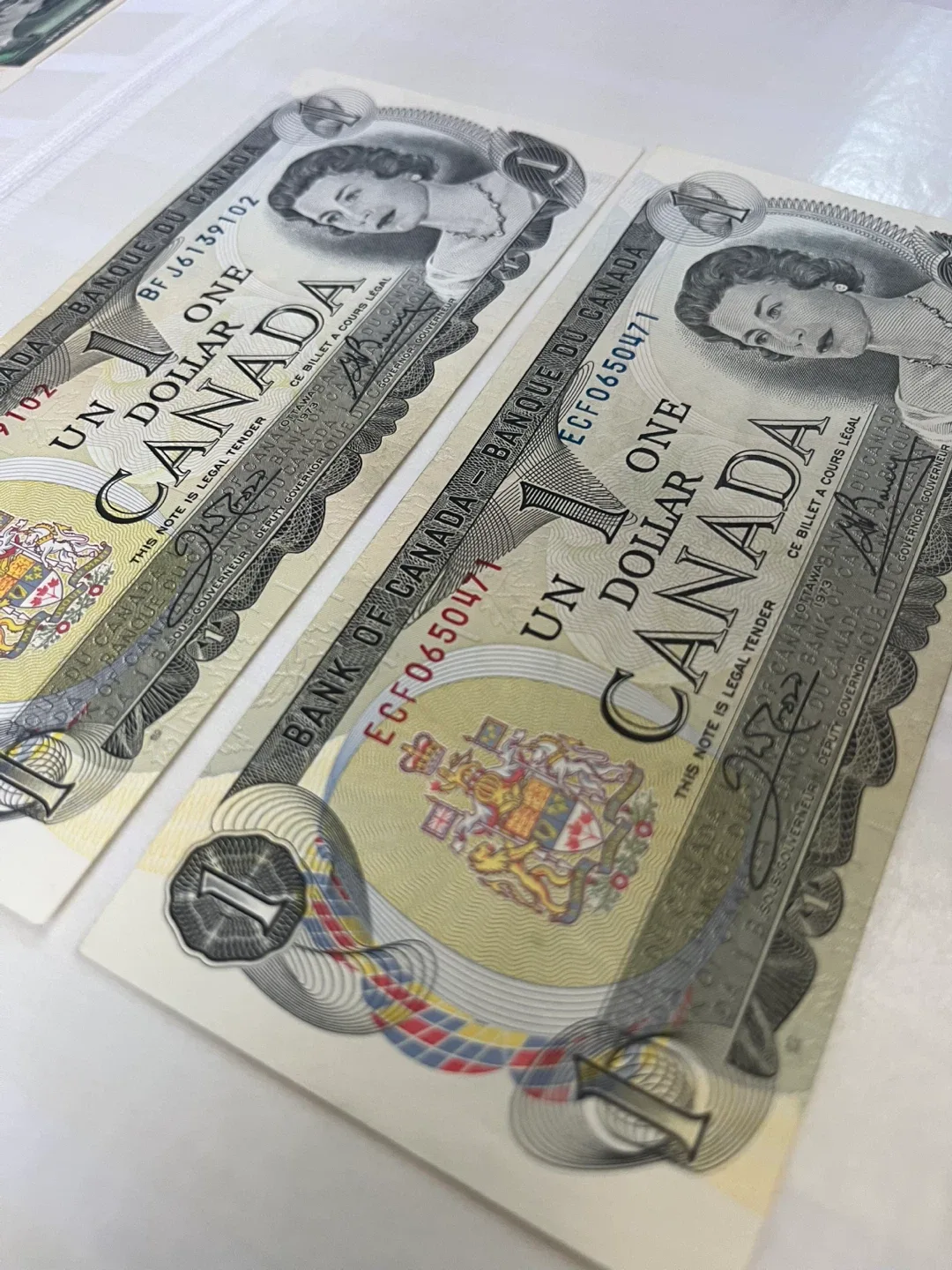 Two 1973 Canadian $1 Bills image indicator(3)