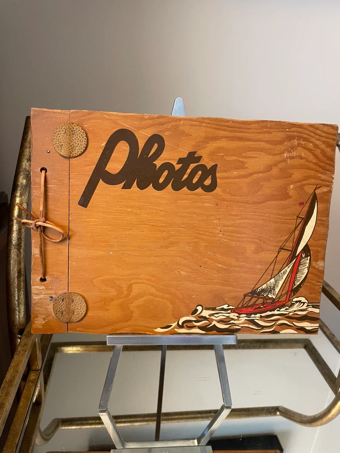 Vintage Wooden Photo Album with Sailboat Design thumbnail