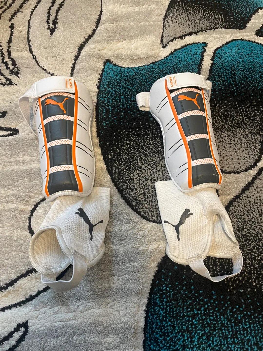 Puma Liga Shin Guards - White/Orange, Size M 😀 image indicator(2)
