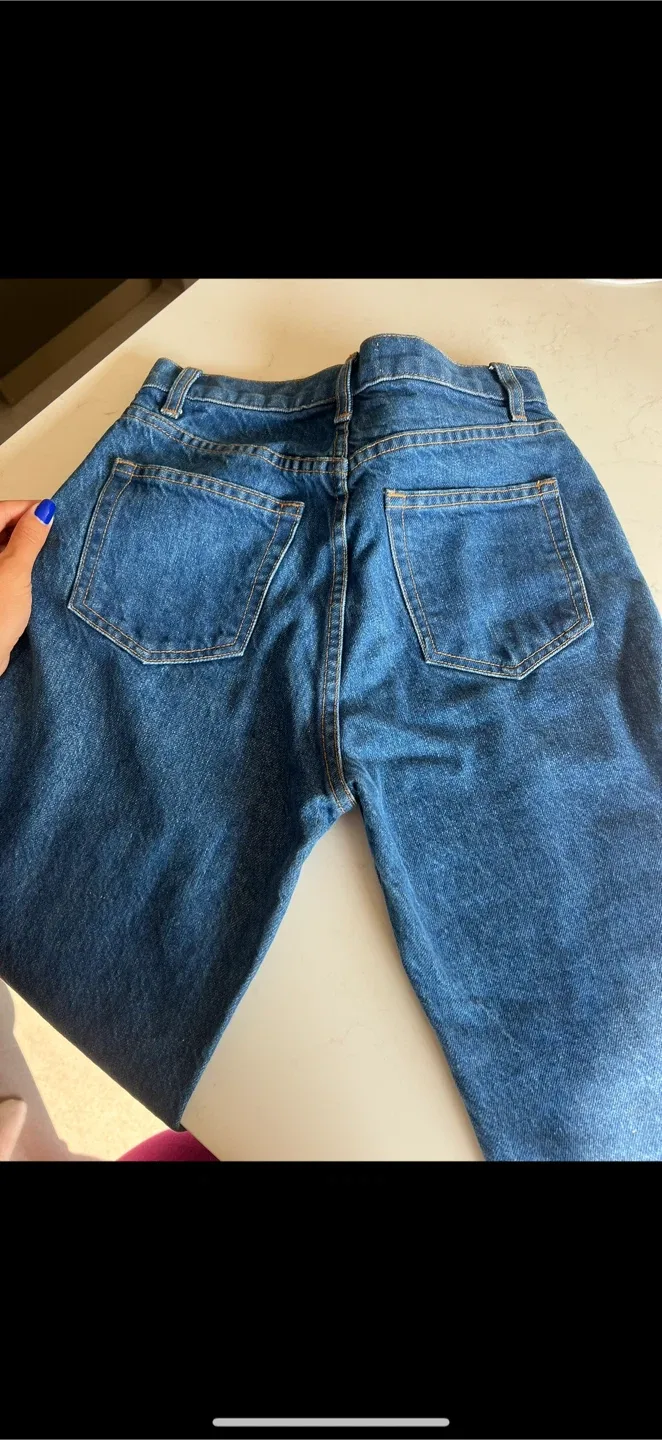 Reformation high waist medium wash jeans image indicator(3)