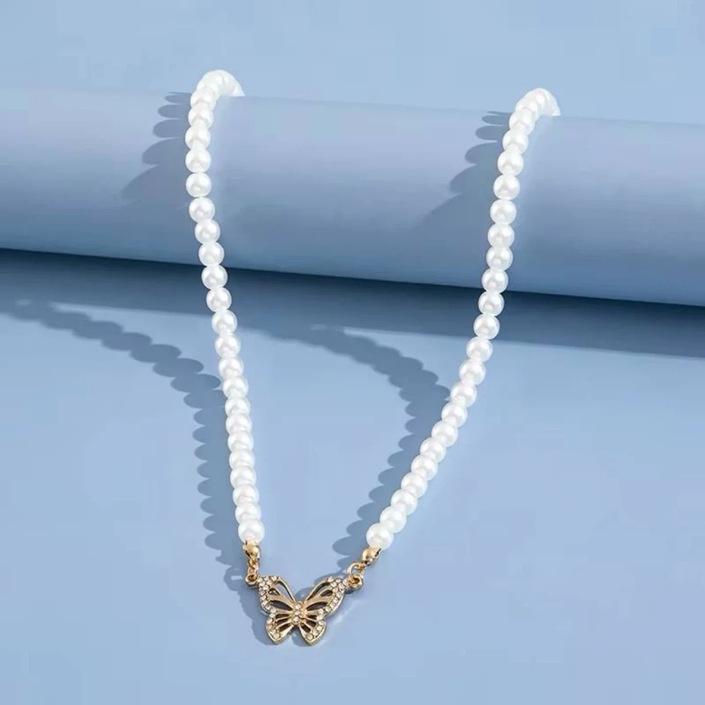 Pearl and Butterfly Necklace , Urban Outfitters thumbnail