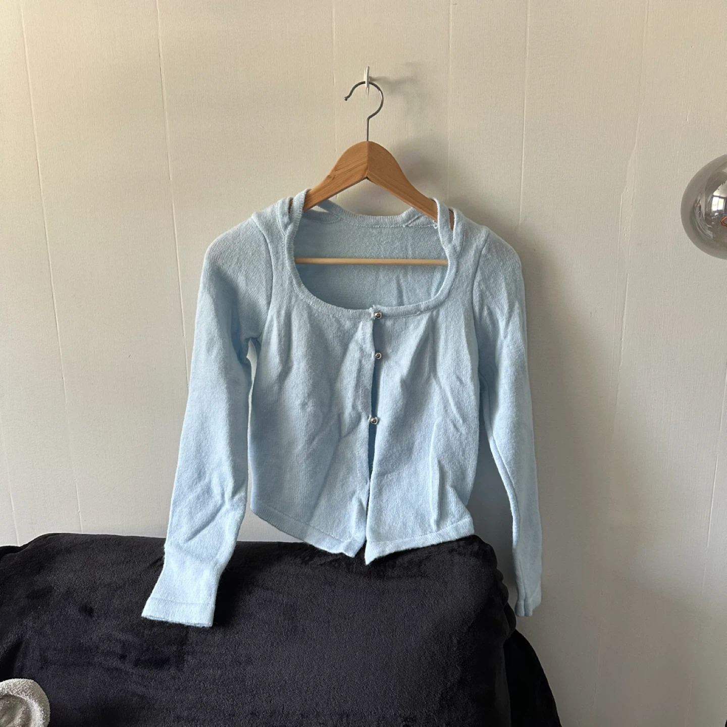 Blue cropped button-up long sleeve sweater with cutout neckline
