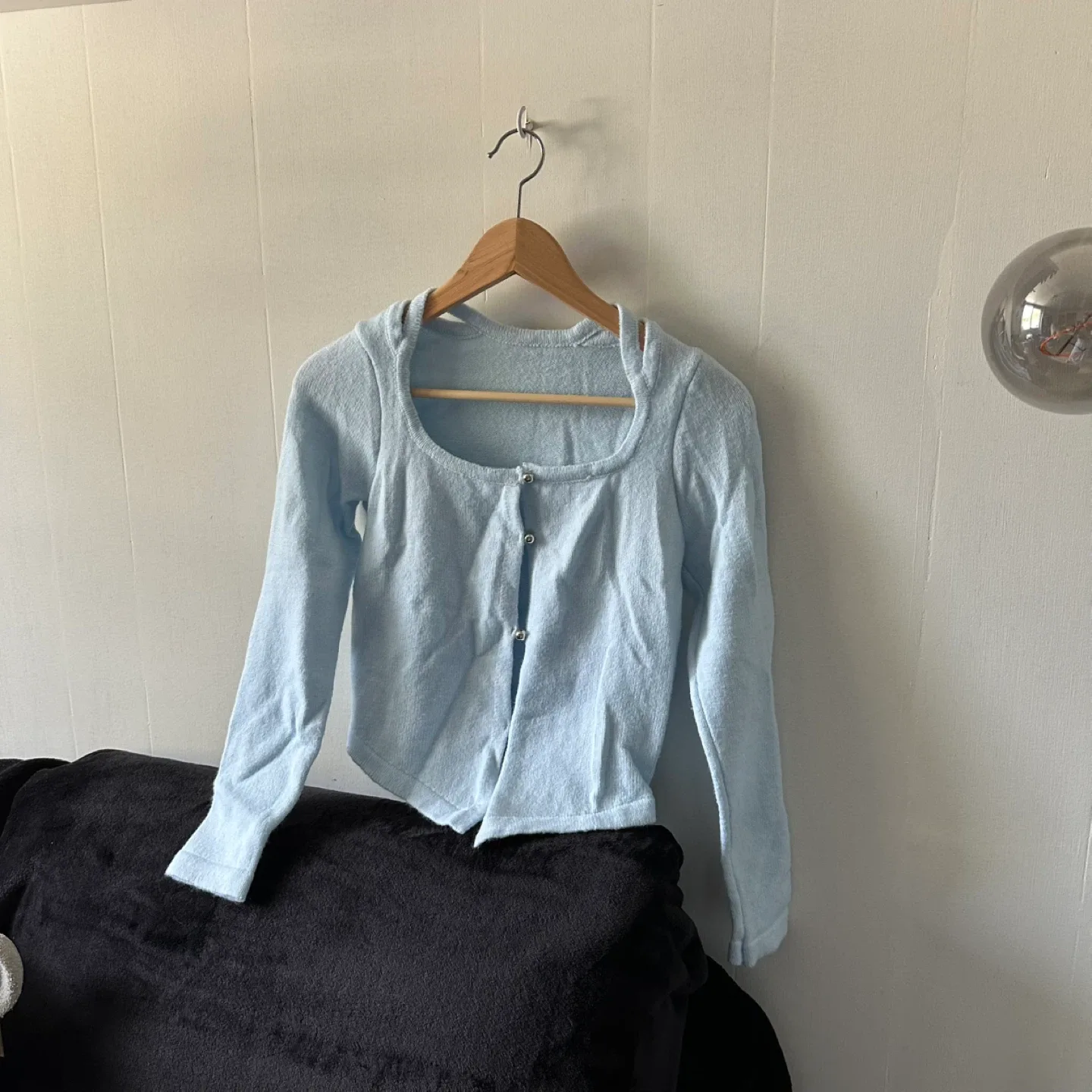 Blue cropped button-up long sleeve sweater with cutout neckline image indicator(2)