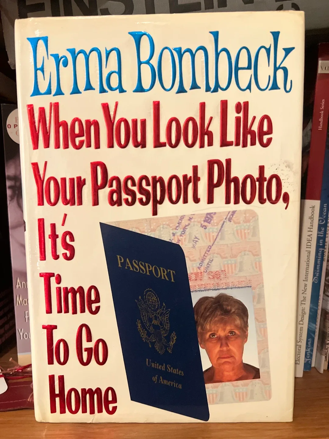 When You Look Like Your Passport Photo by Erma Bombeck thumbnail