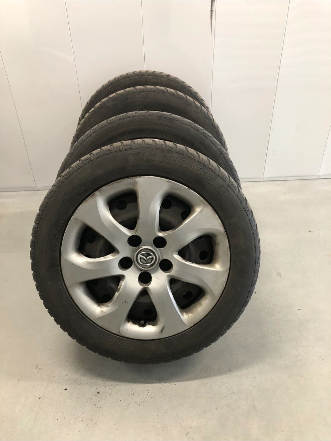 (4) 205/55R16 91T Winter Tires / Steel Rims / Mazda Hubcaps