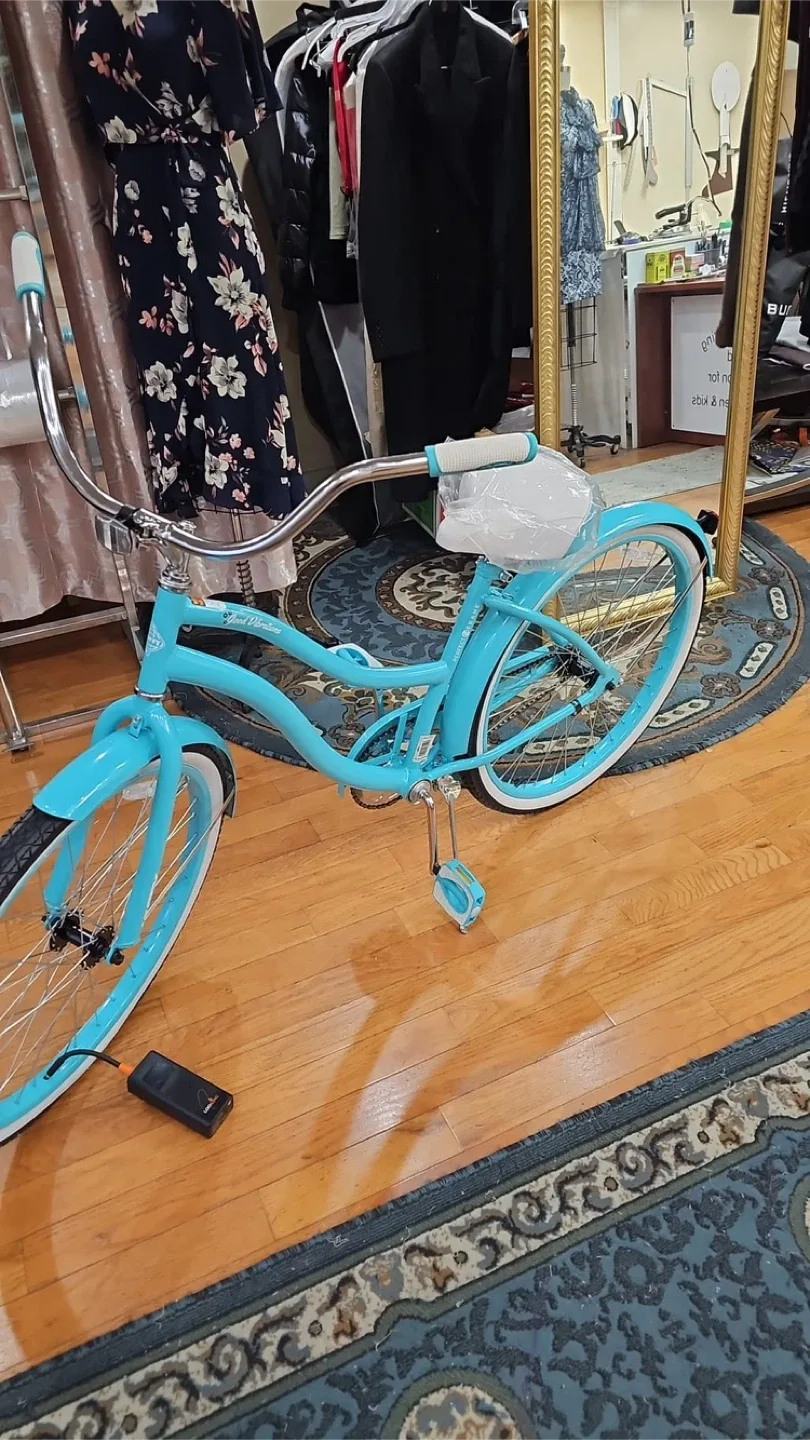 Huffy Women/ girls Turquoise Bike passport photo included