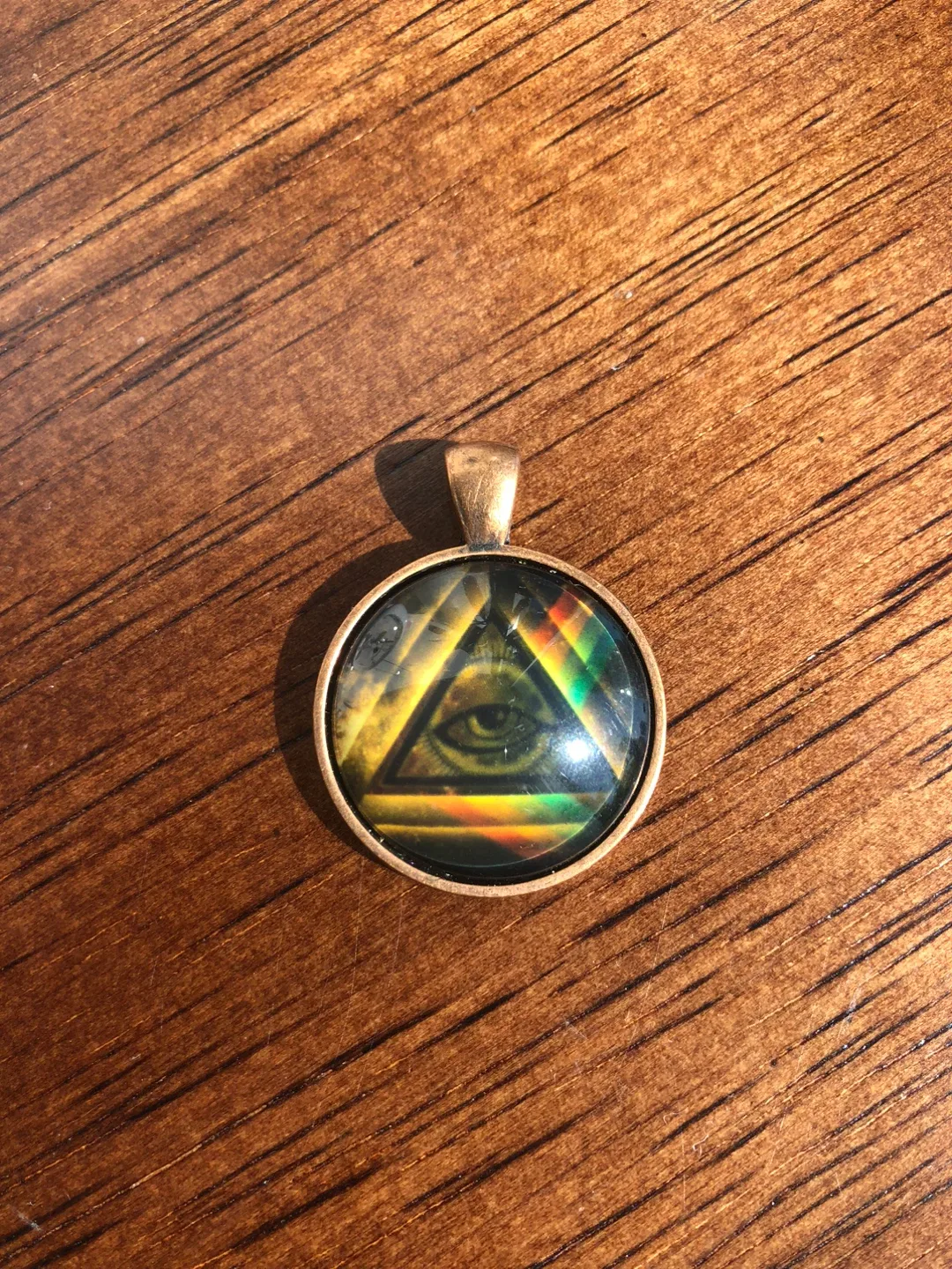 FREE Round Pendant with Eye Design thumbnail