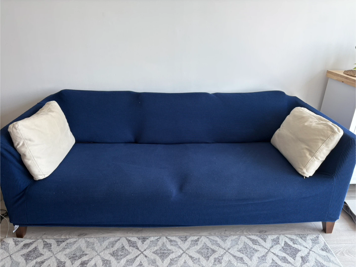 Beige Sofa with Blue Cover