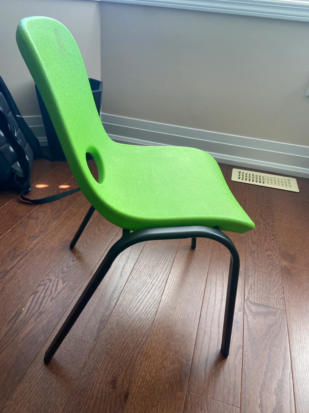 Green Plastic Chair with Black Metal Legs