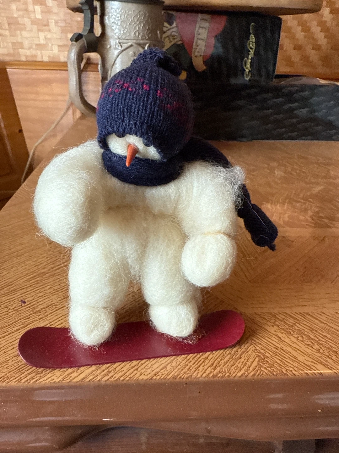 Snowman on Snowboard Figurine