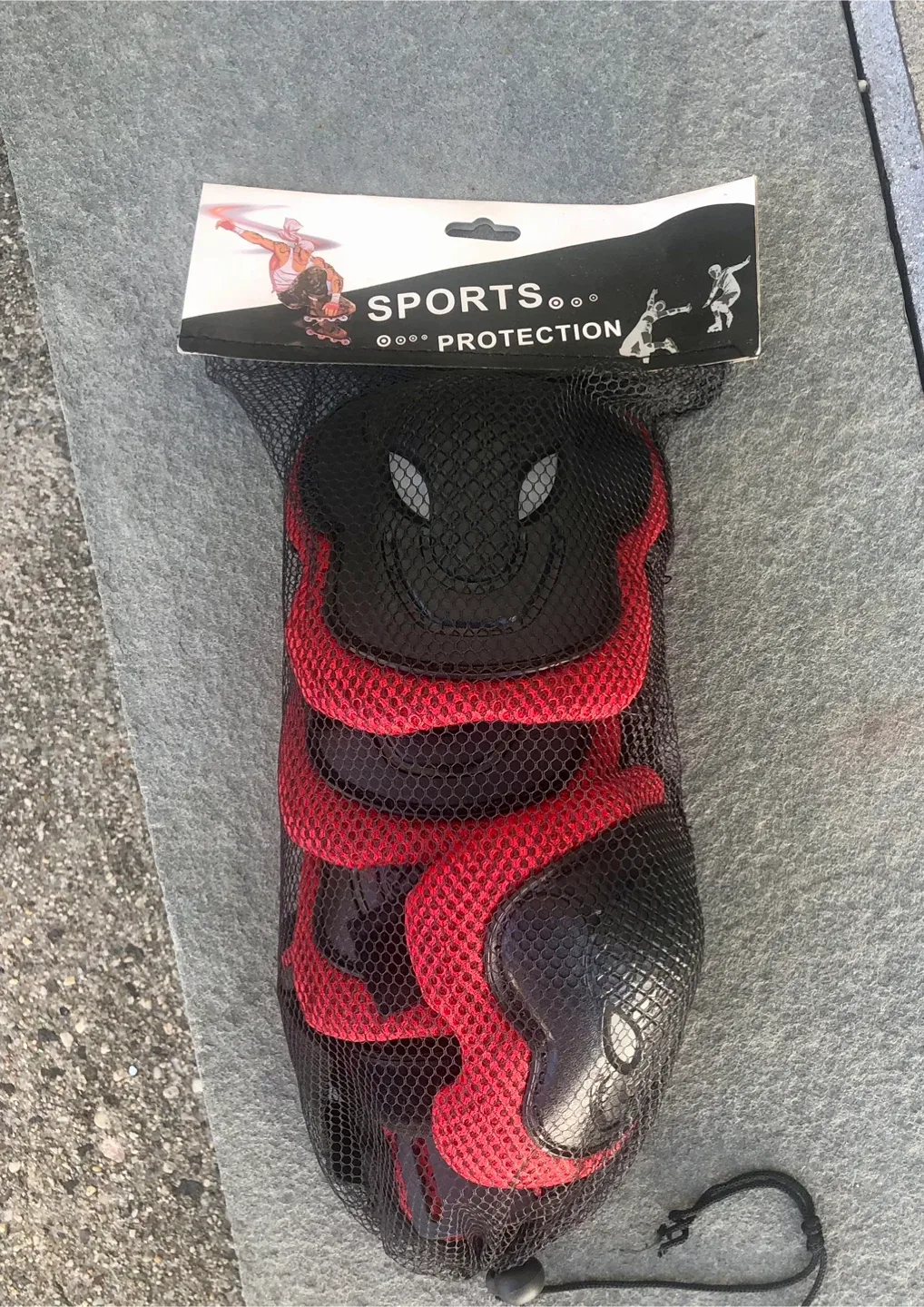 Skateboard with Sports Protection Gear image indicator(3)