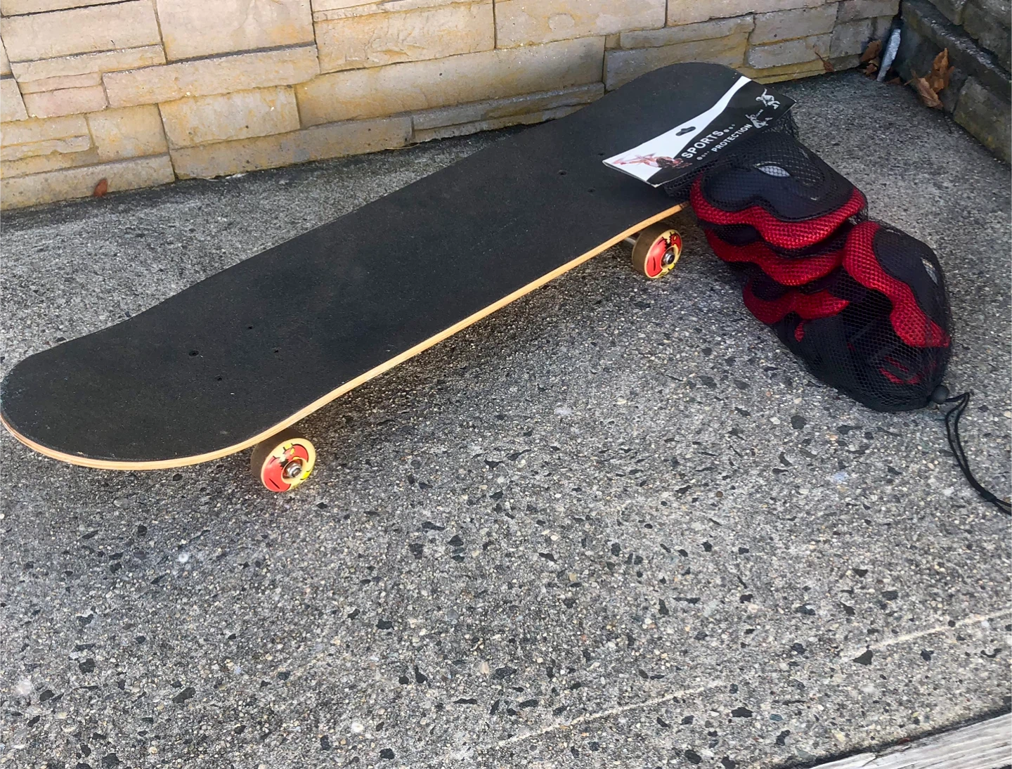 Skateboard with Sports Protection Gear