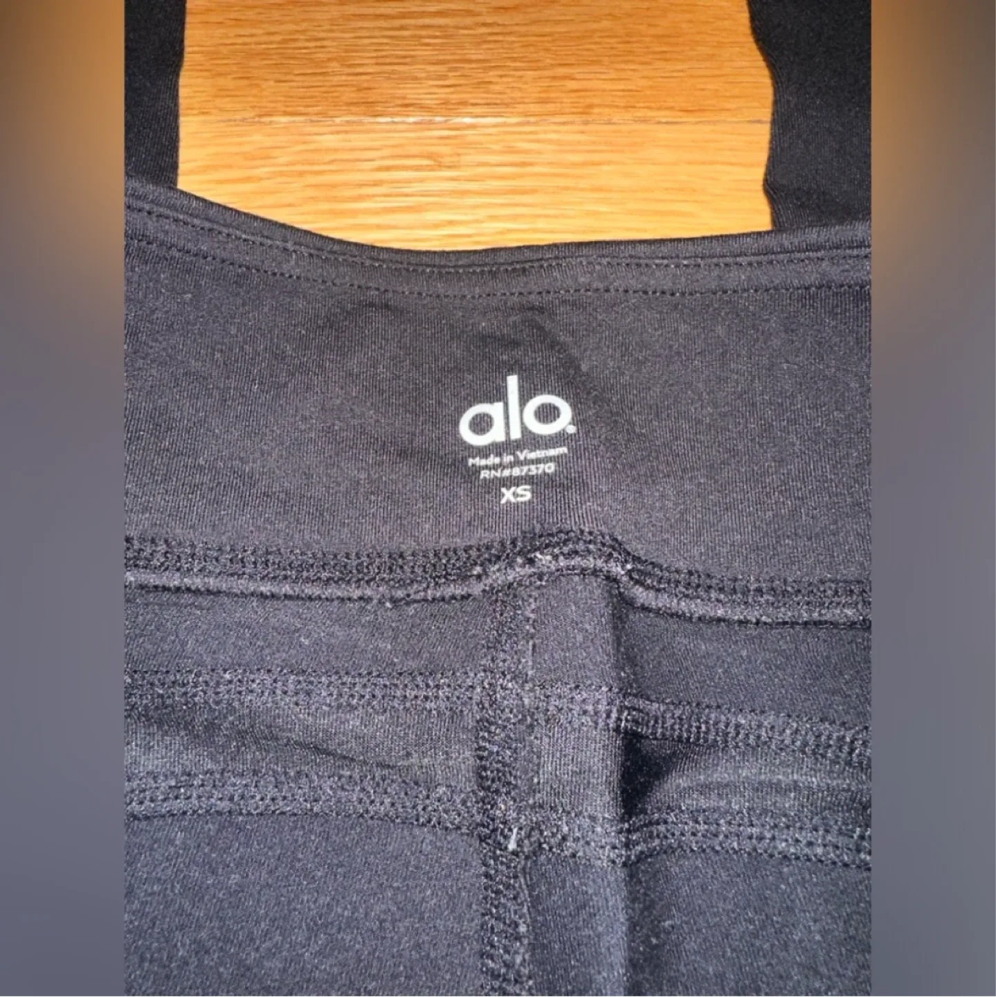 Alo black ribbon leggings XS image indicator(4)