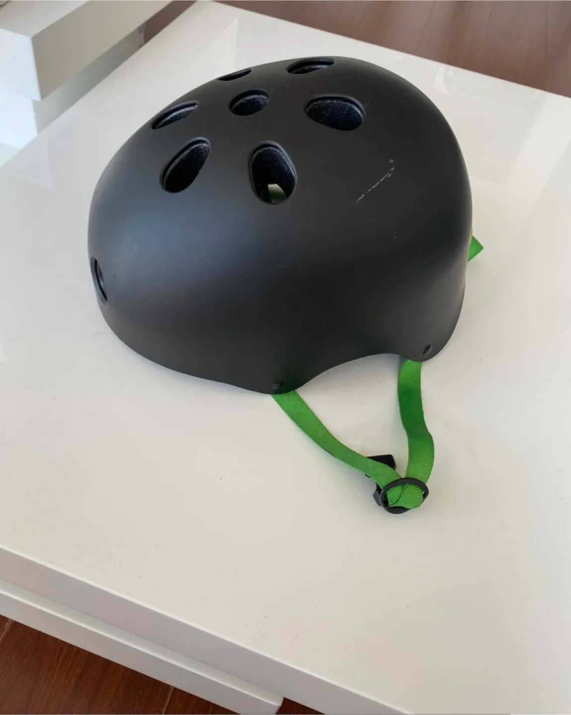 Black Helmet with Green Straps