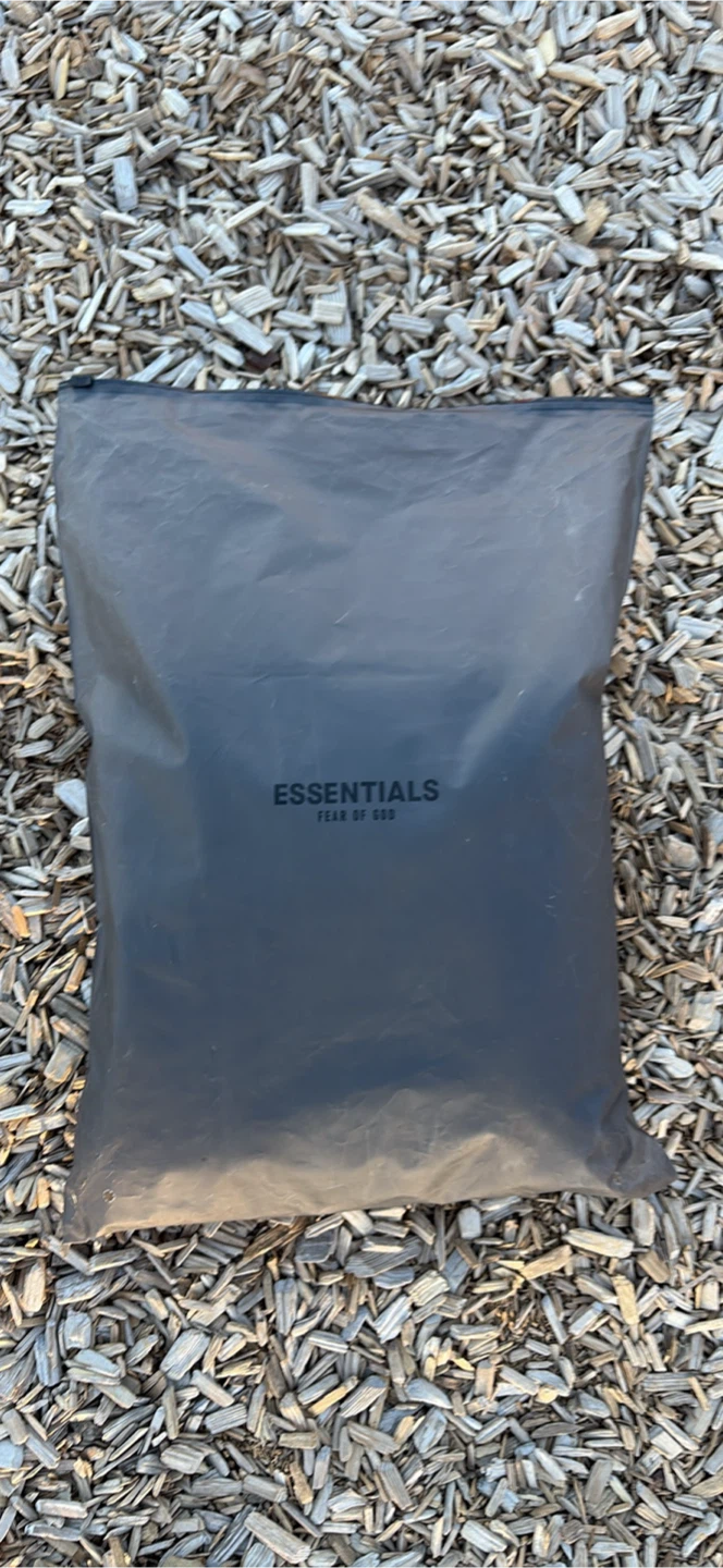 Essentials black pants size medium included bag and the tag