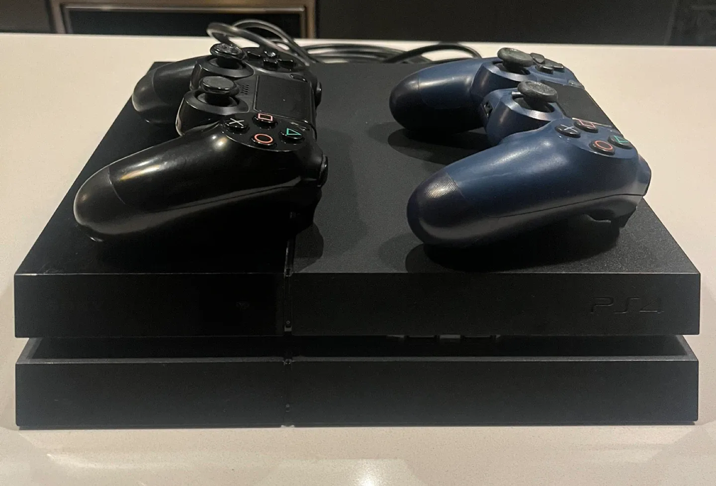 PlayStation 4 (PS4) with 2 Controllers