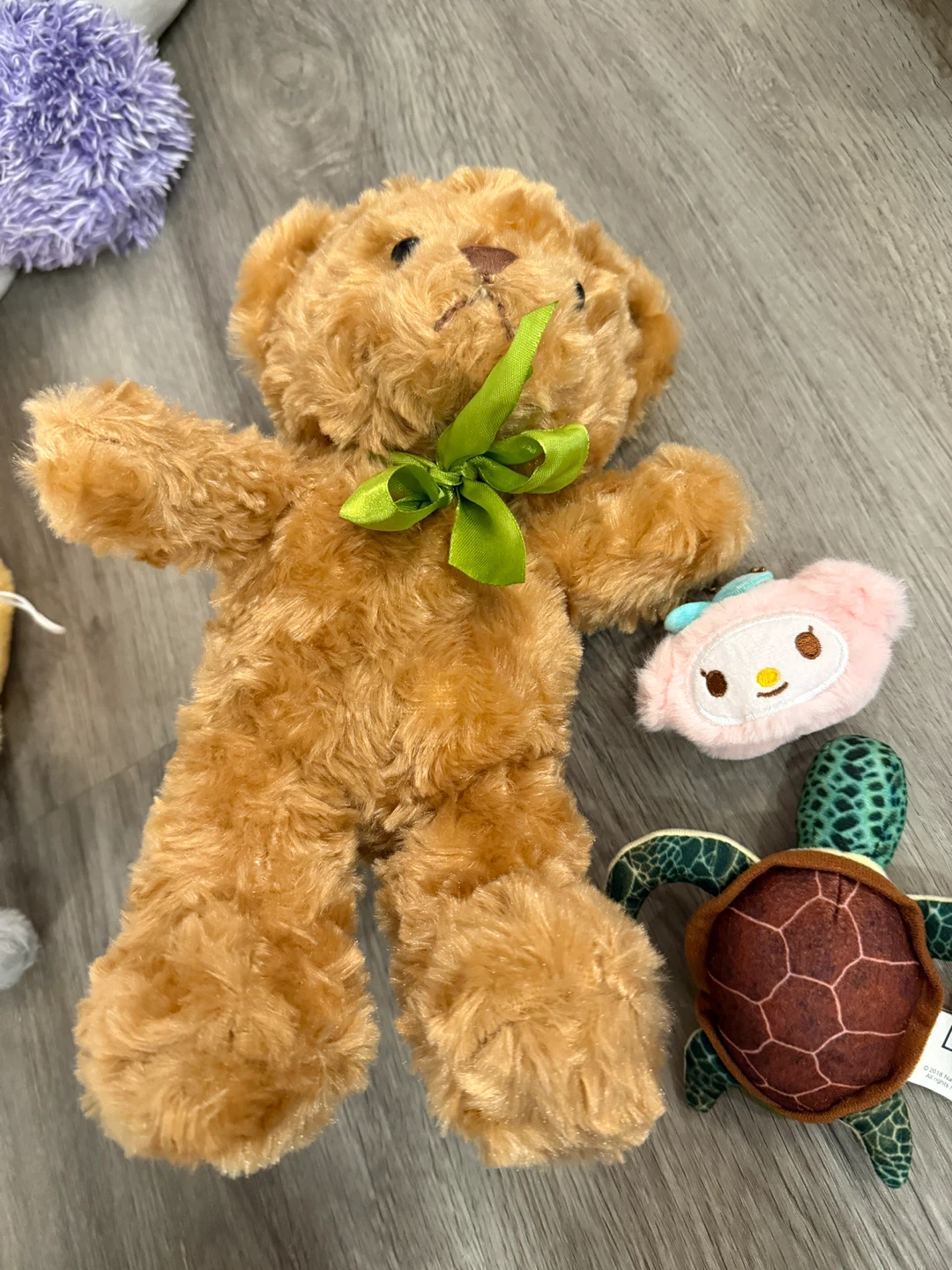 Cute Brown Teddy Bear with Green Ribbon